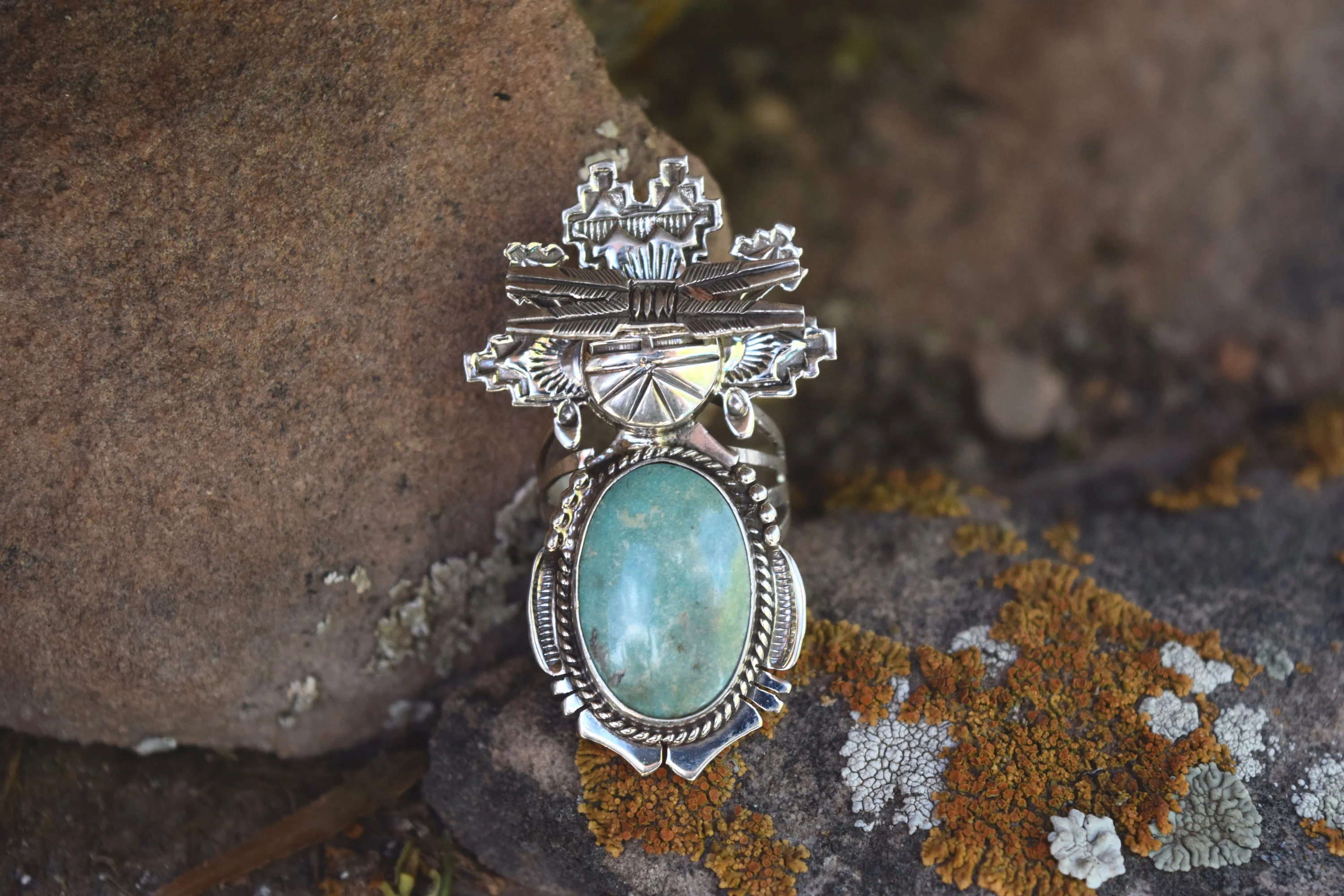 FOUR FEATHERS RING FROM THE RODGERS COLLECTION